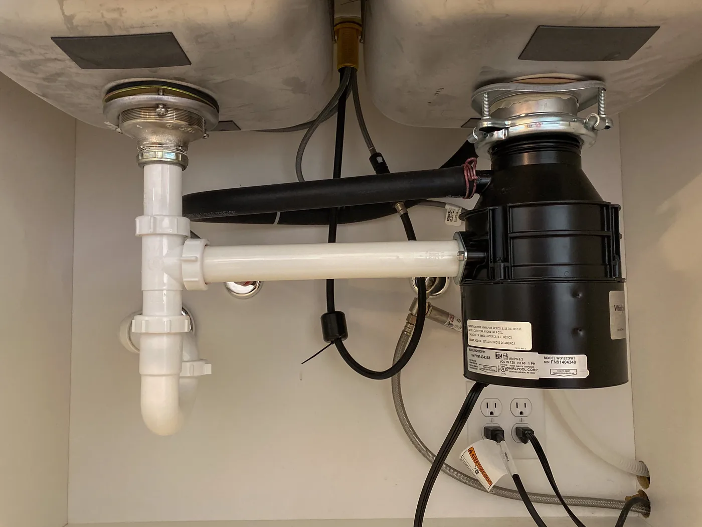 Garbage Disposal Leak Cleanup in a San Mateo home